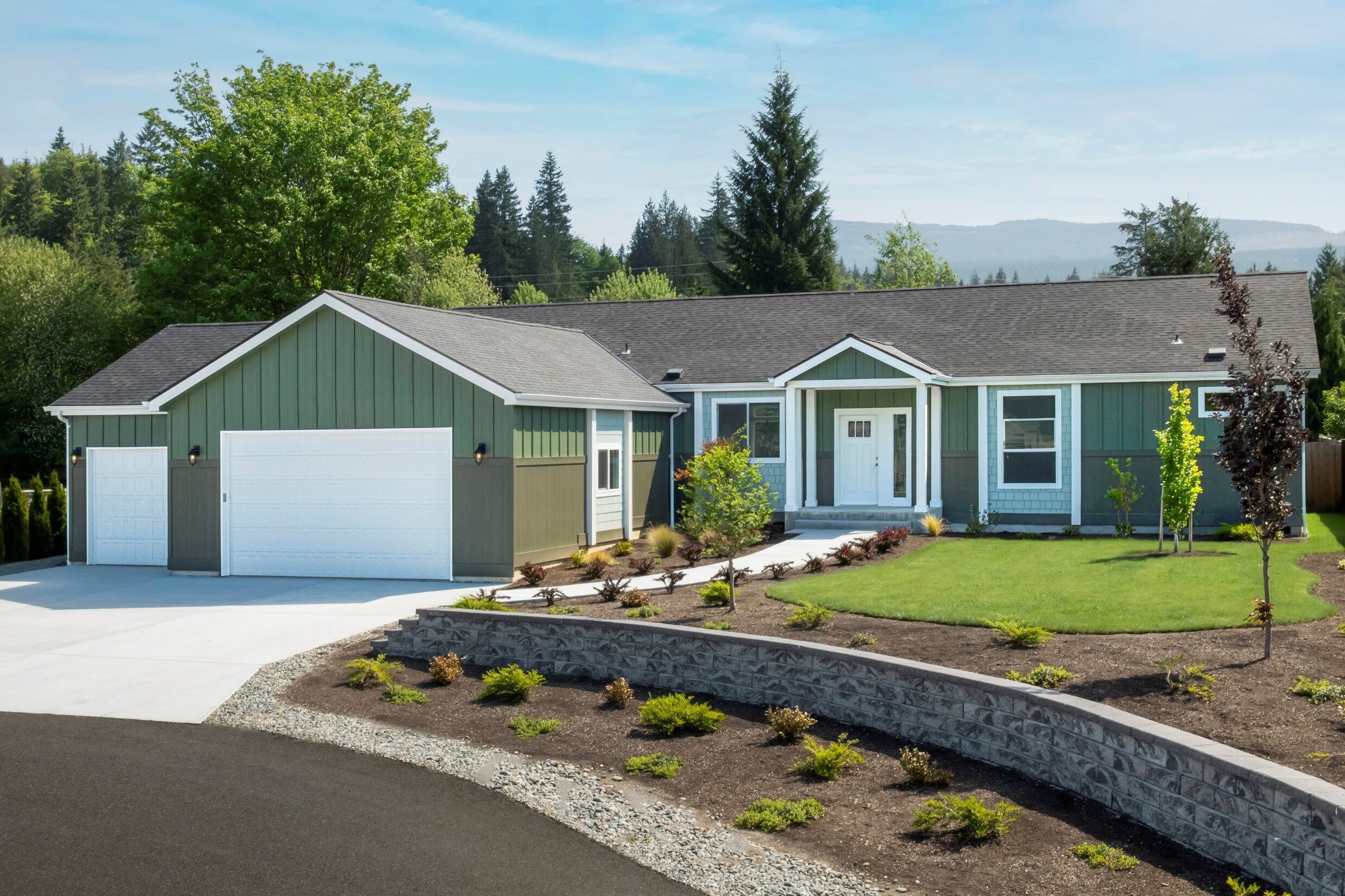 manufactured home with green siding