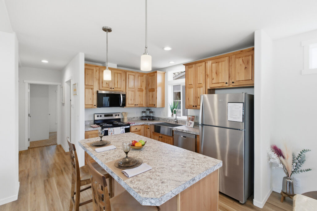 manufactured home kitchen with wooden cabinets