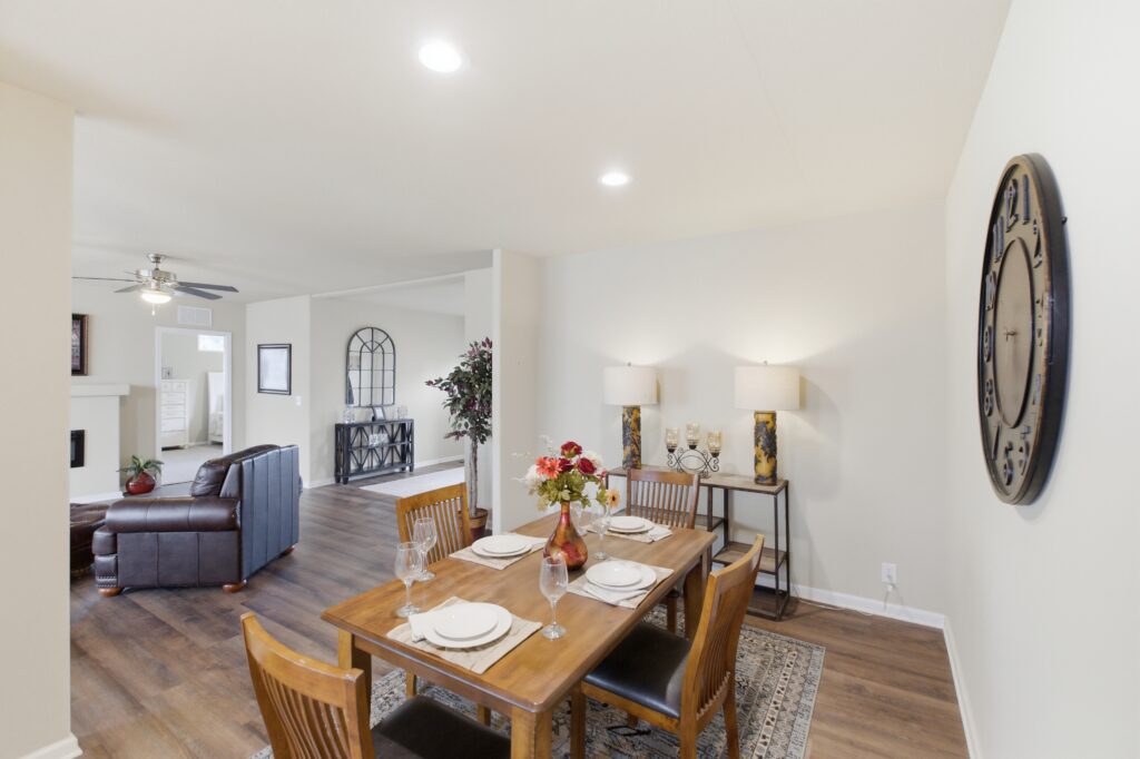 open plan living room and dining room in manufactured home